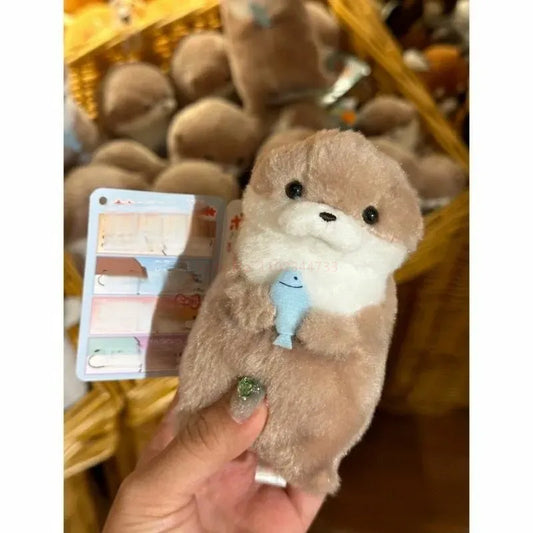 Cute Fluffy Otter Holding Fish Plushie