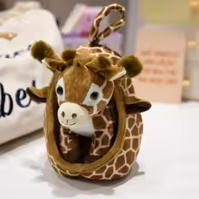 Baby Giraffe In Nest Plush
