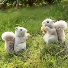 Fluffy Squirrel Eating Nuts Plush